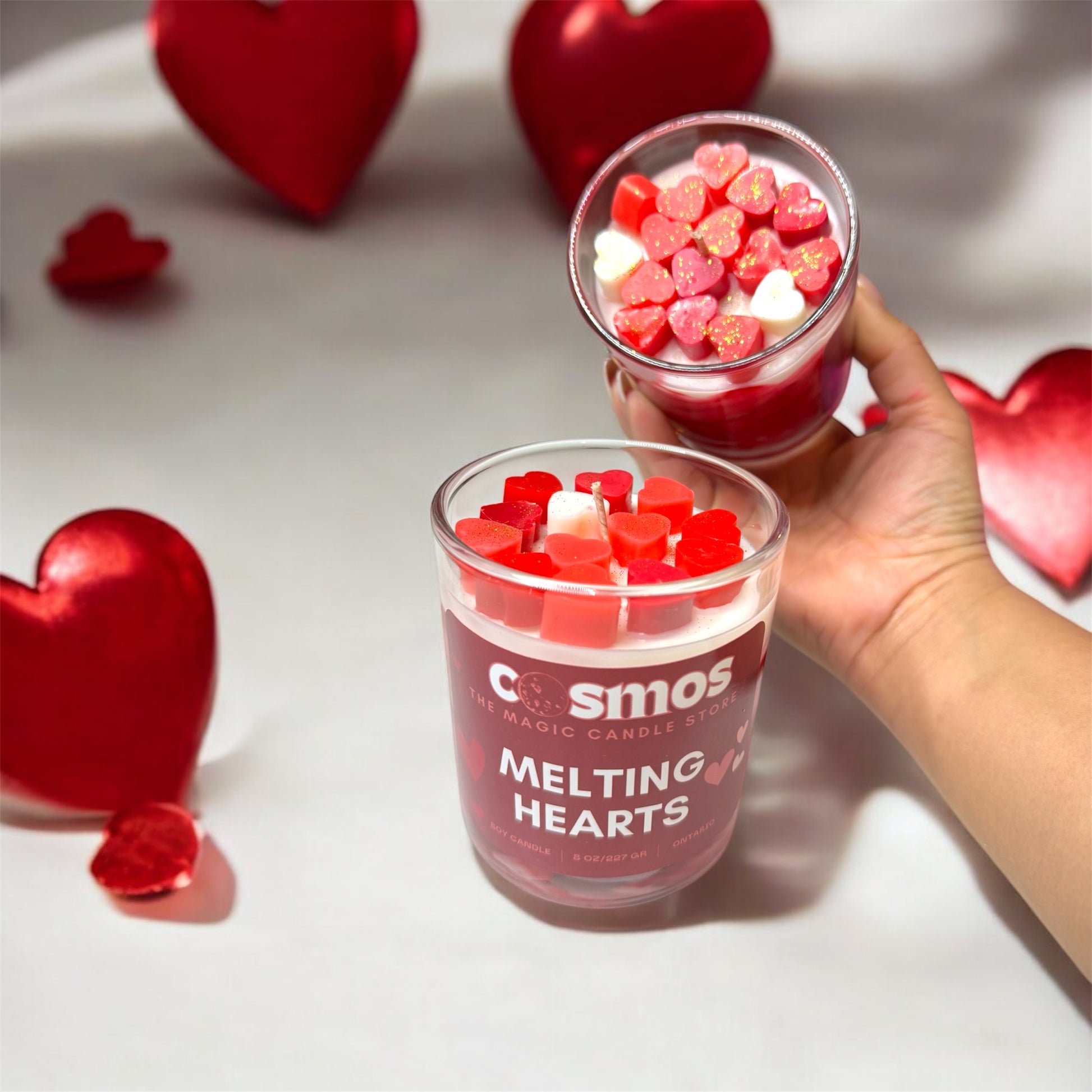 photo of candles with soy wax hearts on top